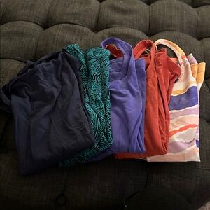 Women's Lululemon race back tank tops.  5 tops.  All size 6.   Great condition.